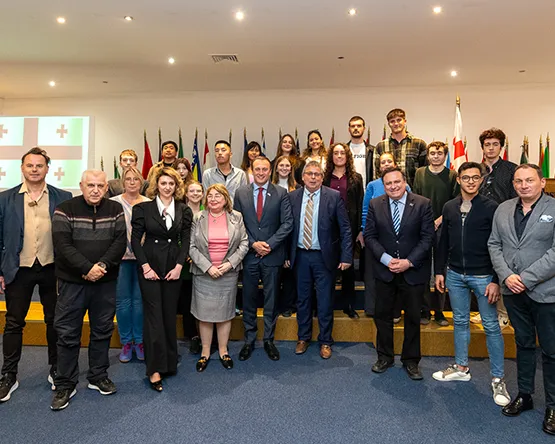 Levan Beridze, ambassador of Georgia to Greece, poses for a photo with Webster Athens students, leadership, faculty and staff following his lecture.