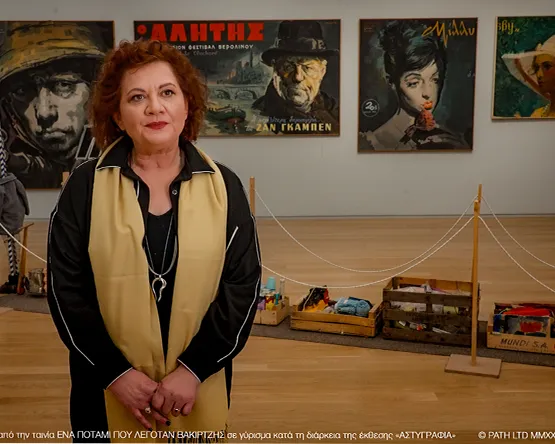 Syrago Tsiara, historian and Director of the National Gallery of Greece, appears in a scene from A River Called Vakirtzis, filmed during the 'Astygrafia' exhibition.